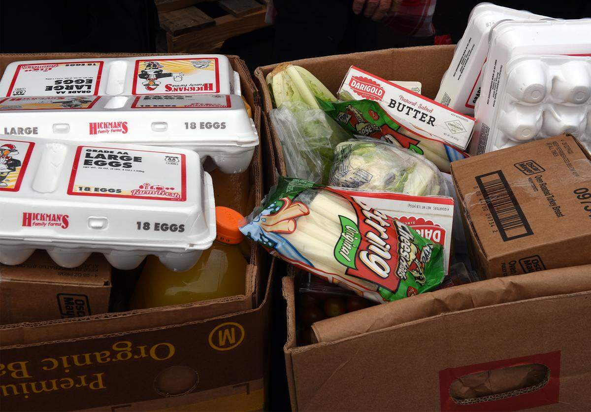 Boxes of food are pictured Monday morning January 22, 2018 at Pentecostal Church in downtown, Modesto, Calif. Second Harvest Food Bank has the food giveaway once a month in Modesto. The next one is scheduled for February 12th.