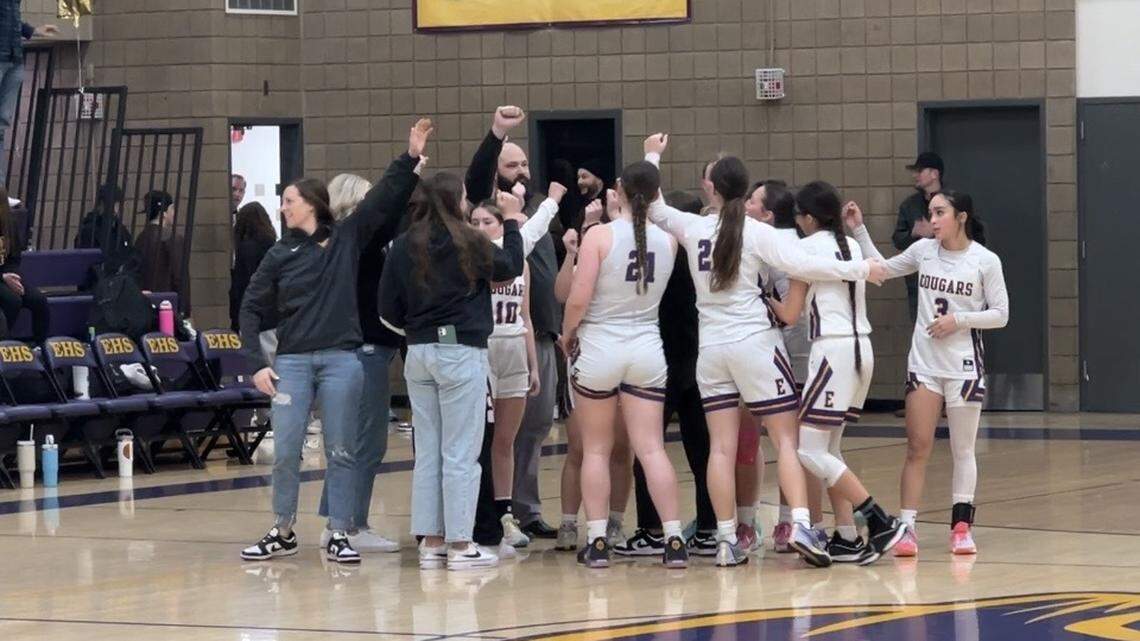 The Escalon girls basketball team huddles after securing a 49-47 win over West Campus in the Sac-Joaquin Section Division IV semifinals. The Cougars play Colfax in the section championship Friday at UC Davis.