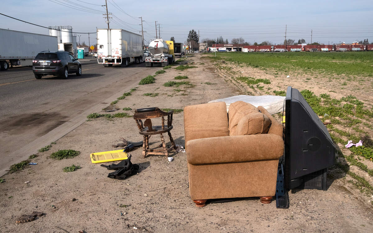 Furniture has been discarded along South McClure Road in Modesto, Calif., on Friday, Jan. 28, 2022.