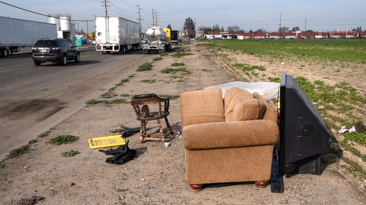 Furniture has been discarded along South McClure Road in Modesto, Calif., on Friday, Jan. 28, 2022.