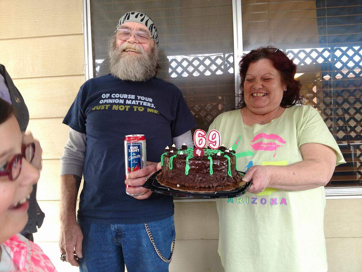 John and Debra Parodi, pictured here celebrating a birthday, were killed in the home they shared in north Modesto, California. Their bodies were found June 5, 2018.