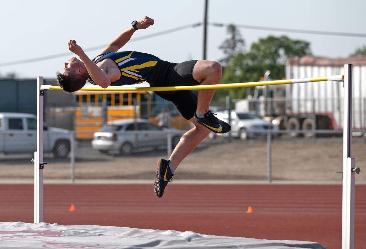Turlock jumper Max McFarlane clears the 6-foot mark in the high jump during the Stanislaus County Championships on Friday, March 18, 2022, at Riverbank High School in Riverbank, Calif. McFarlane tied for first.