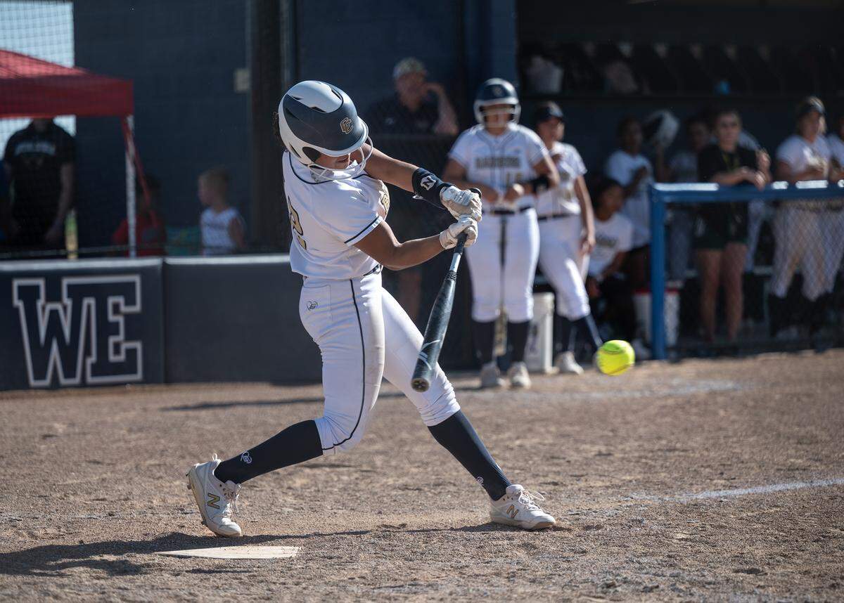 Central Catholic’s Jazmarie Roberts drives in a runner with a single during the CIF Sac-Joaquin Section Division III softball playoff game with Merced at Central Catholic High School in Modesto, Calif., on Thursday, May 19, 2022. Central Catholic won the game 4-1.