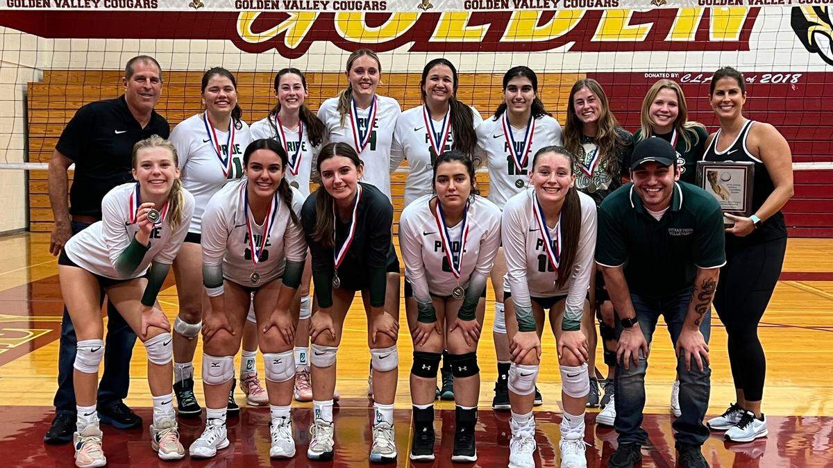 Pitman High volleyball players and coaches take a picture after winning the Central California Classic at Golden Valley High School. The Pride have started the season 15-2.