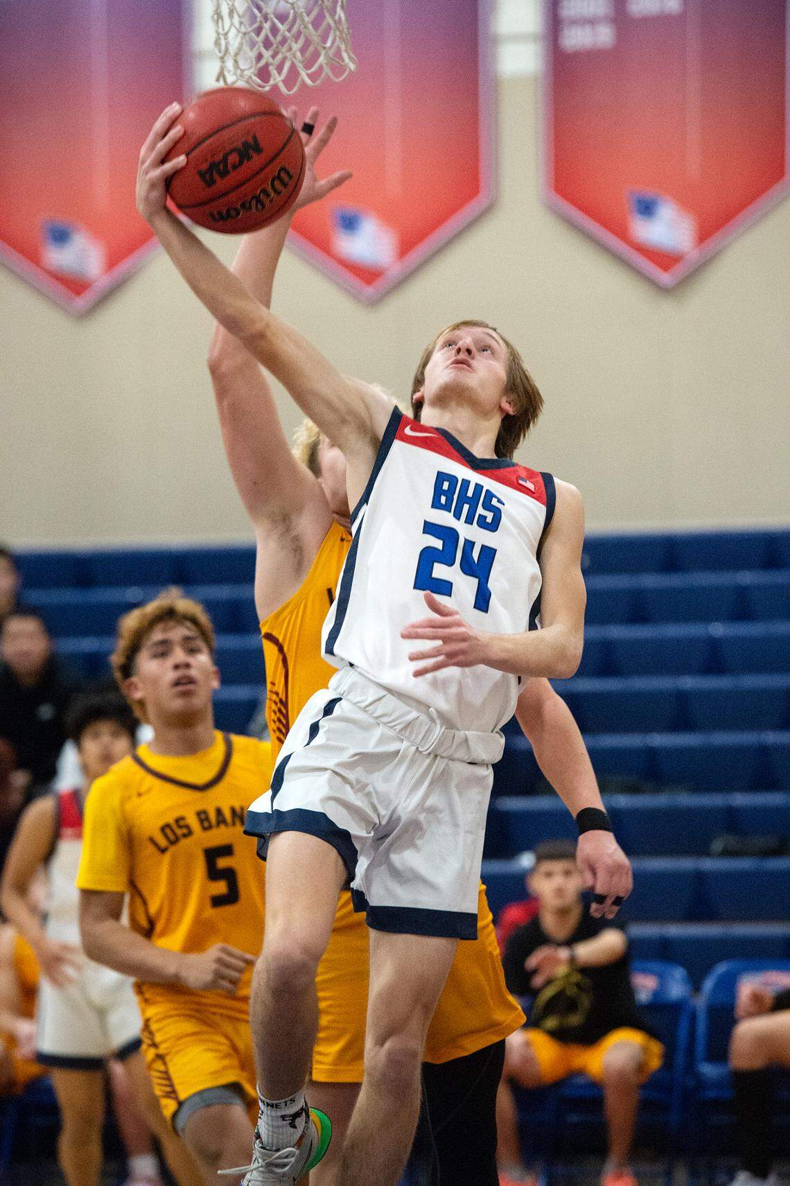 Beyer’s Brock Gross scores on a reverse layup during the Western Athletic Conference game with Los Banos at Beyer High School in Modesto, Calif., Wednesday, Jan. 4, 2023.