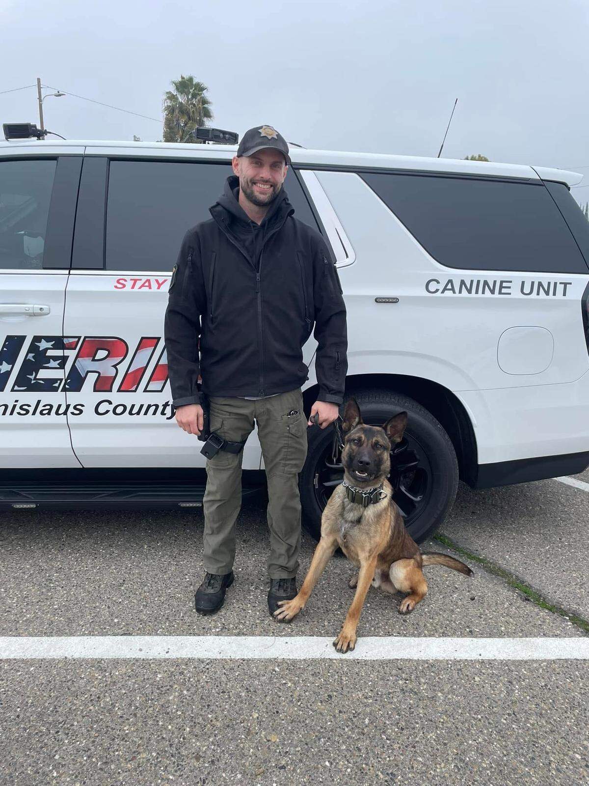 Deputy Mason McKinstry with his K9 partner, Zero, in front of a Sheriff’s Office patrol vehicle. Zero was McKinstry’s first K9 partner.