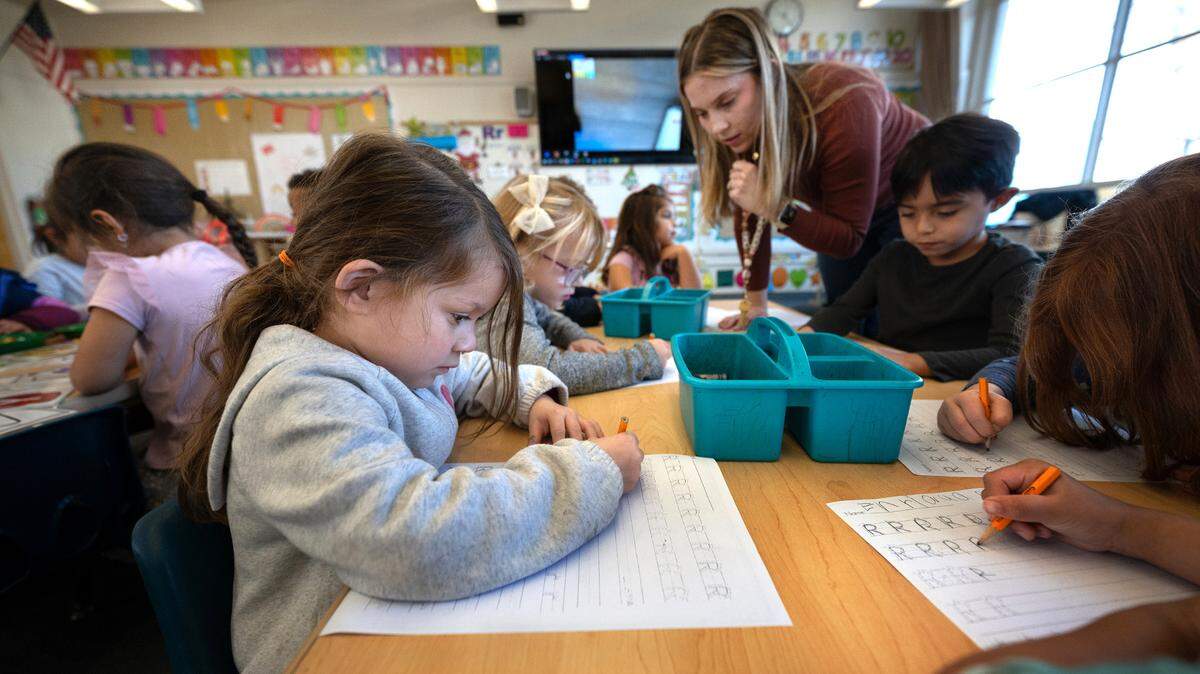 Transitional kindergarten student Vivienne Villarreal, left, and her classmates practice handwriting at Fremont School in Modesto.
California’s Transitional Kindergarten expands, but families face barriers like limited info, program hours and availability. Awareness and access are crucial.