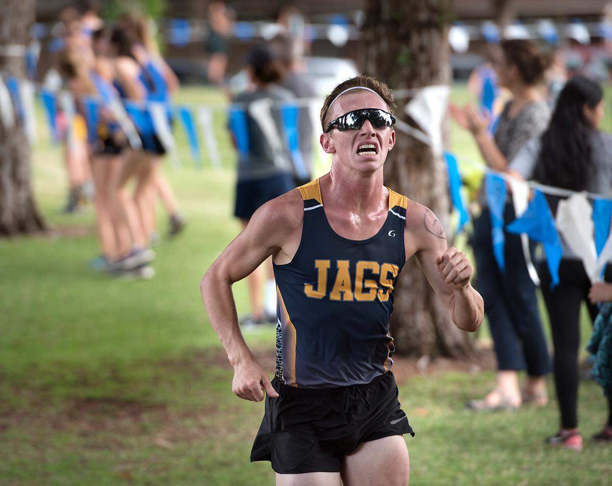 Gregori runner Jackson Duchala sprints to a second place finish in the varsity race during the CCAL meet at Donnelly Park in Turlock, Calif., on Wednesday, Oct. 3, 2018. Duchala finished with a time of 16:09.