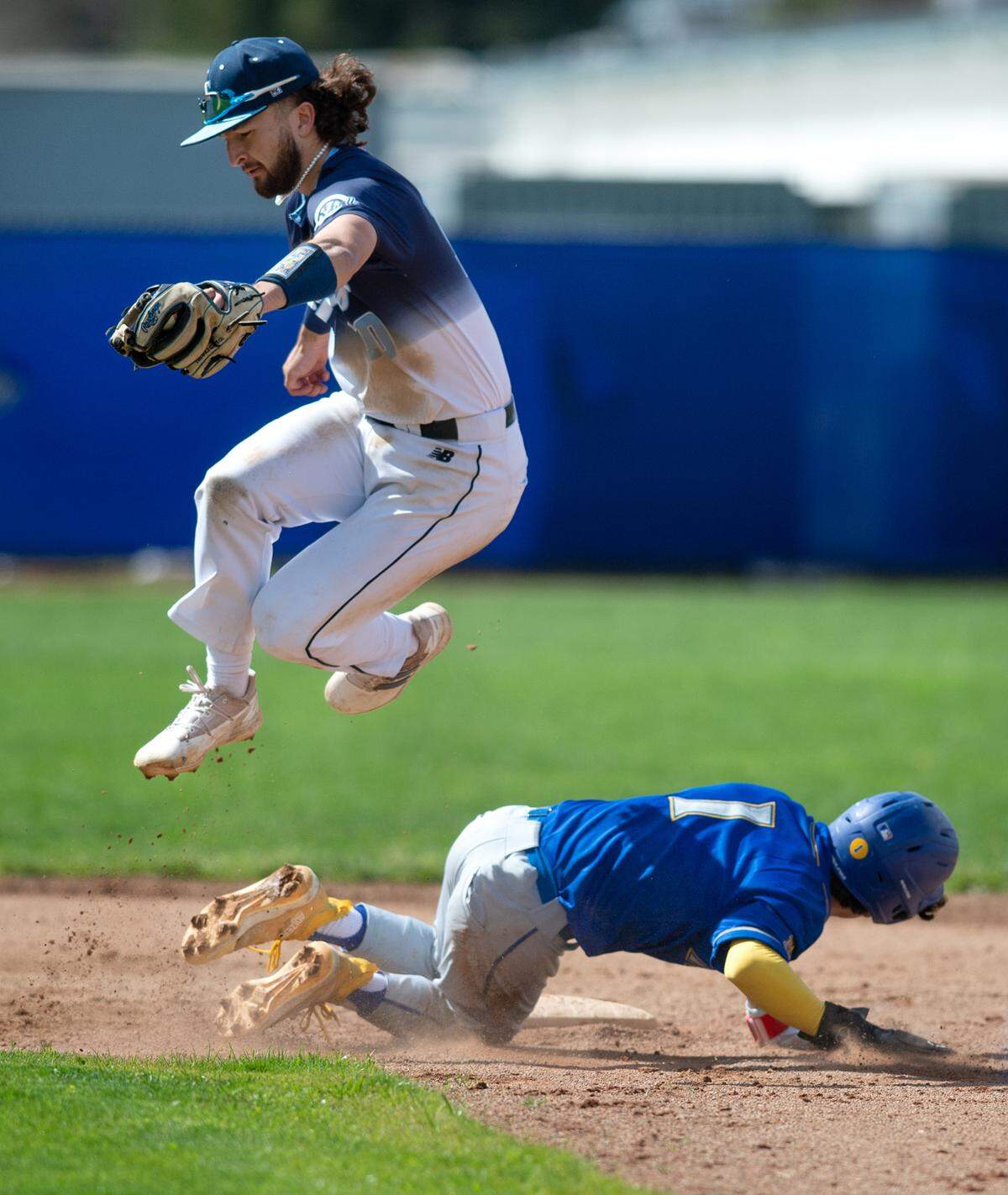 Downey shortstop Camden Rush forces out Turlock runner Josh Ramirez during the Central California Athletic league game at Downey High School in Modesto, Calif., Thursday, March 23, 2023.