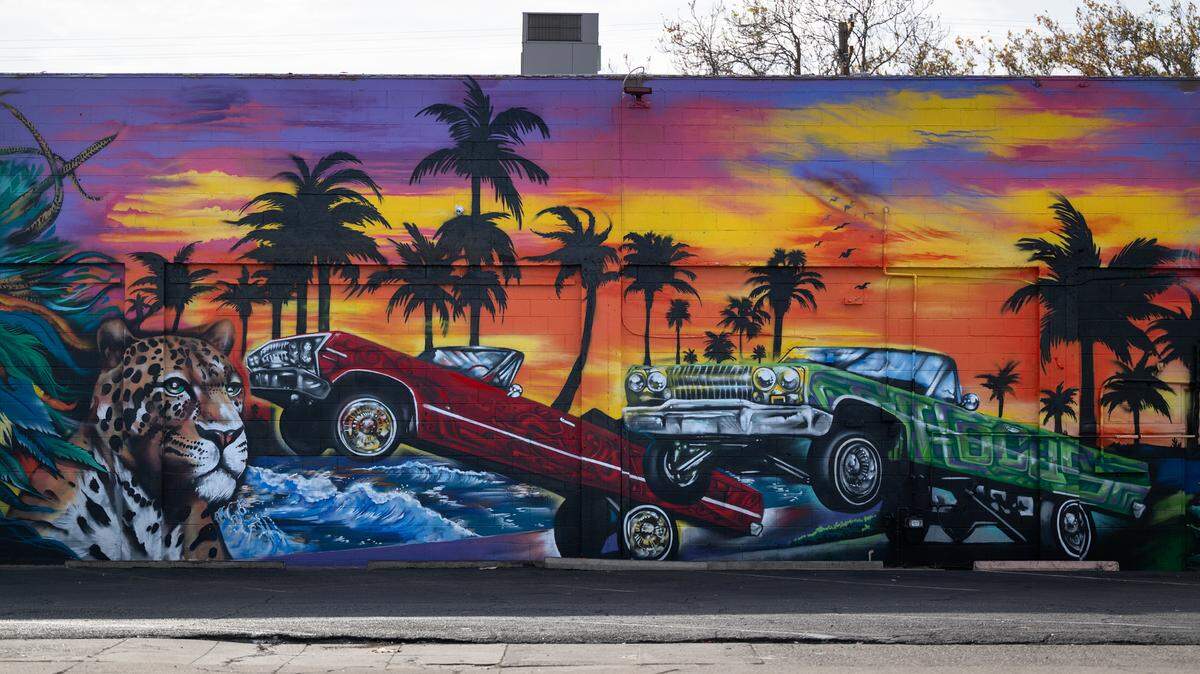 New mural by muralist Jose “Hocus” Manriquez on the east wall of Johnny’s Market on H Street in Modesto, Calif., Wednesday, Nov. 22, 2023.