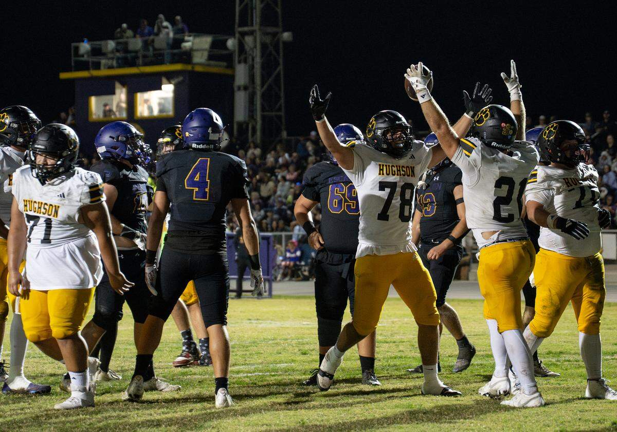 Hughson’s Benji Ocegueda (78) and Eli Wilbanks (21) celebrate a touchdown during the Trans-Valley League game with Escalon at Escalon High School on Friday, Oct. 3, 2025.