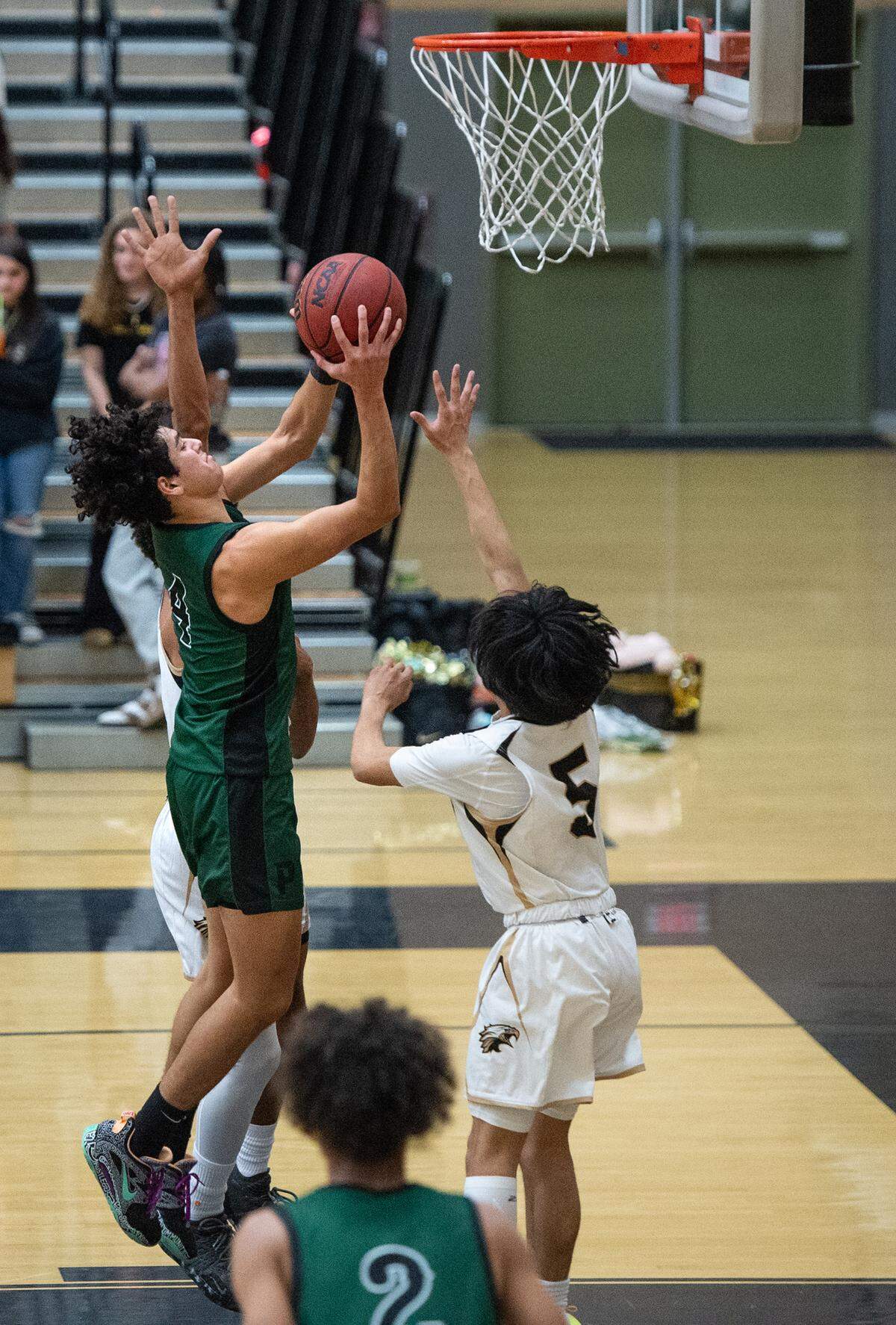 Pitman’s Justin Anderson scores during the Central California Athletic League game with Enochs at Enochs High School in Modesto, Calif., Friday, Feb. 10, 2023. Pitman won the game 56-52.