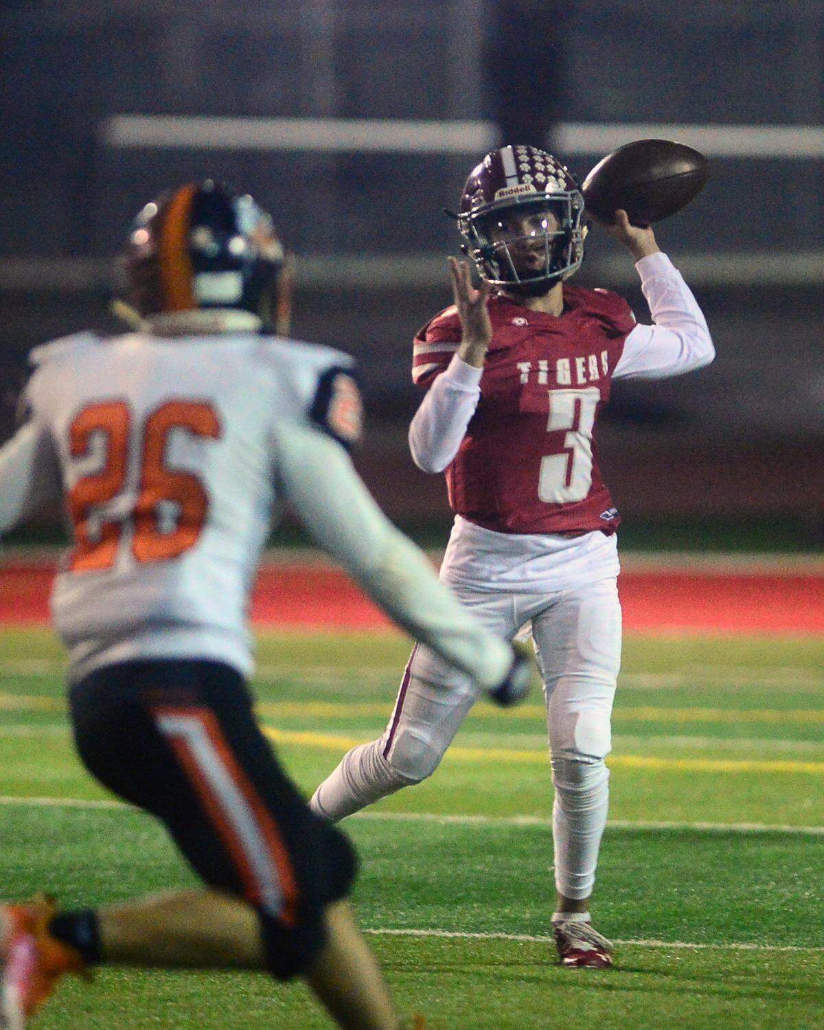 Patterson quarterback Max Medina throws a pass during a CIF Division III Sac-Joaquin Section football playoff game against Roseville at Patterson High School in Patterson, California, on Nov. 11, 2022. Patterson won 56-34.