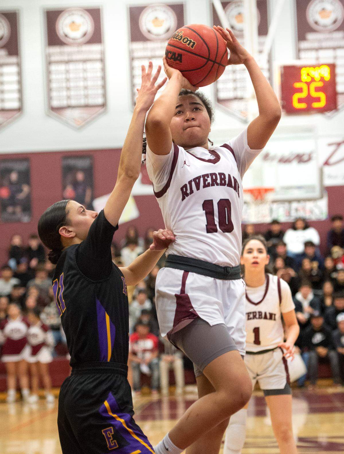 Riverbank’s Chancis Gamez scores on a jumpshot during the Sac-Joaquin section semifinal playoff game with Escalon in Riverbank, Calif., Tuesday, Feb. 21, 2023. The Riverbank girls basketball team advanced to play Colfax in the Division IV section final after beating TVL rival Escalon 58-41 in the semifinals.