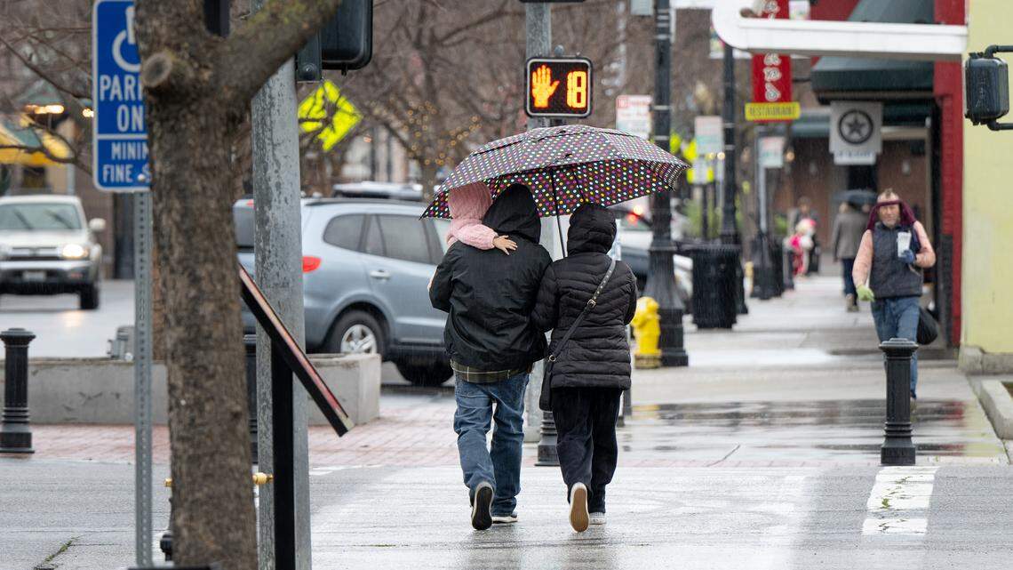 A steady rain falls downtown in Modesto, Calif., Wednesday, Feb. 7, 2024. 