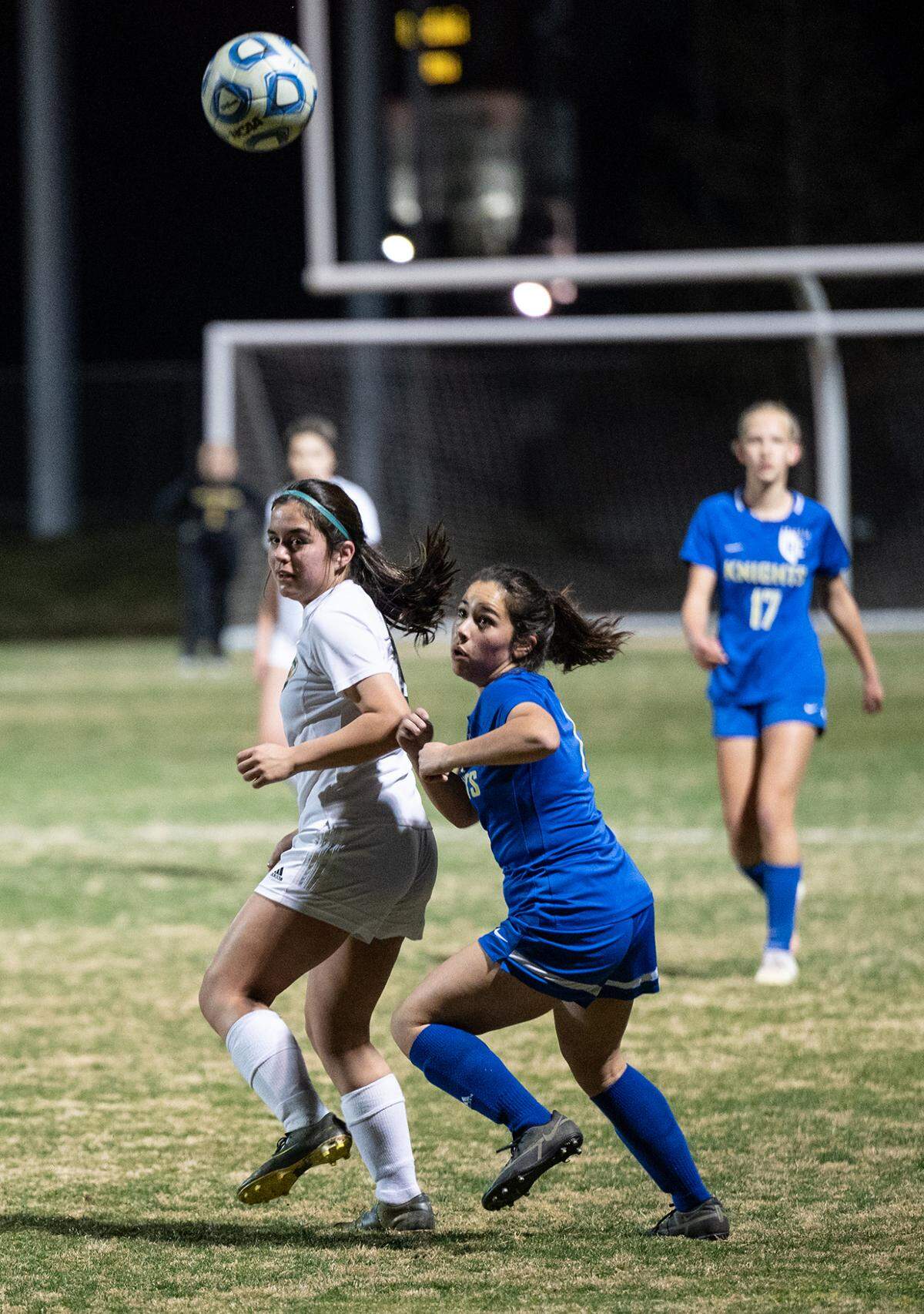 Ripon Christian’s Hailey Henderson, right, tracks the ball during the Division VI playoff game with Mariposa County at Ripon Christian High School in Ripon, Calif., on Wednesday, Feb. 16, 2022. Mariposa County won the game 3-2.