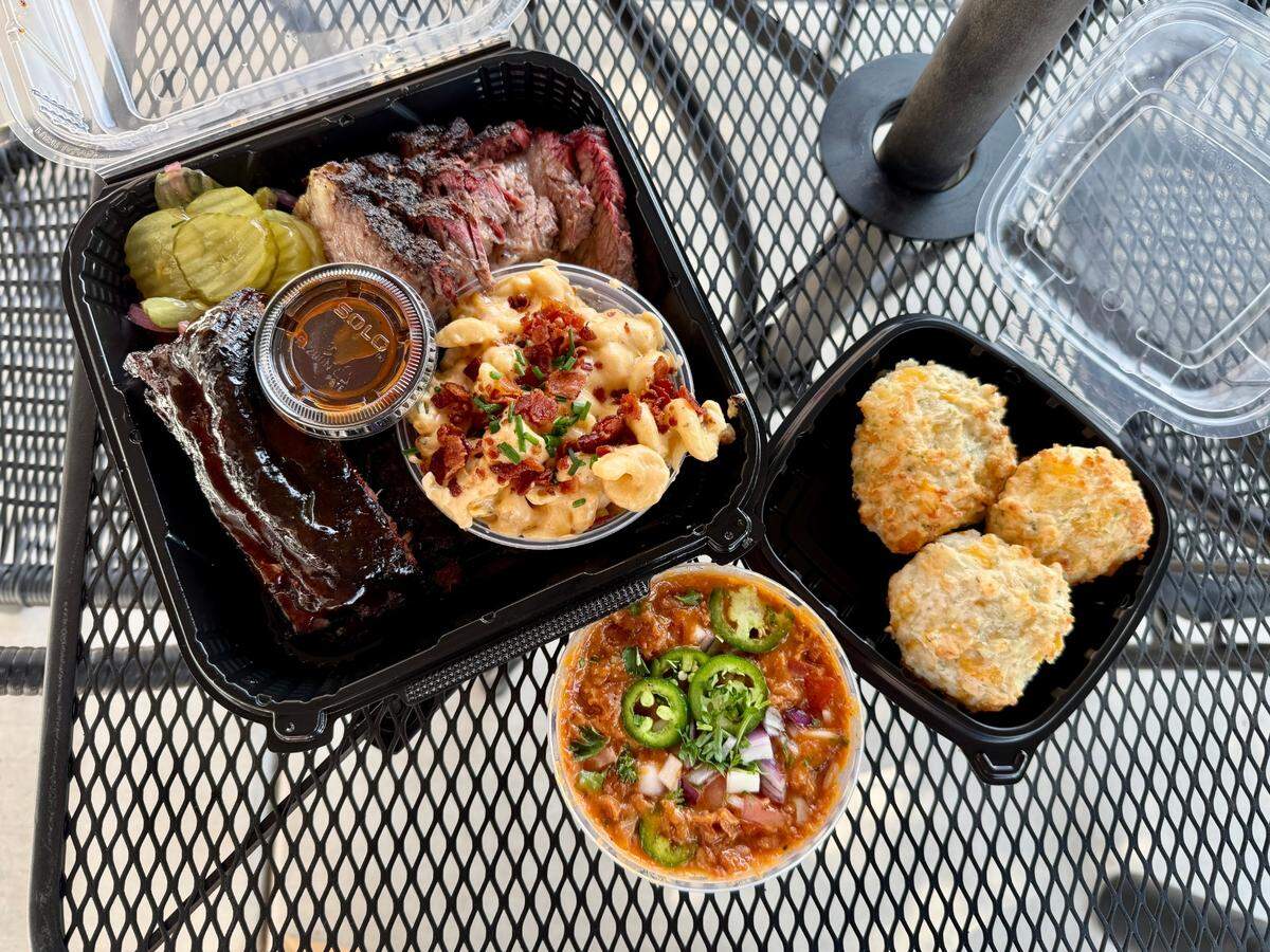 A pork ribs and brisket platter with five-cheese macaroni, charro beans and garlic cheddar biscuits at Craft BBQ & Catering Co. on McHenry Avenue in Modesto.