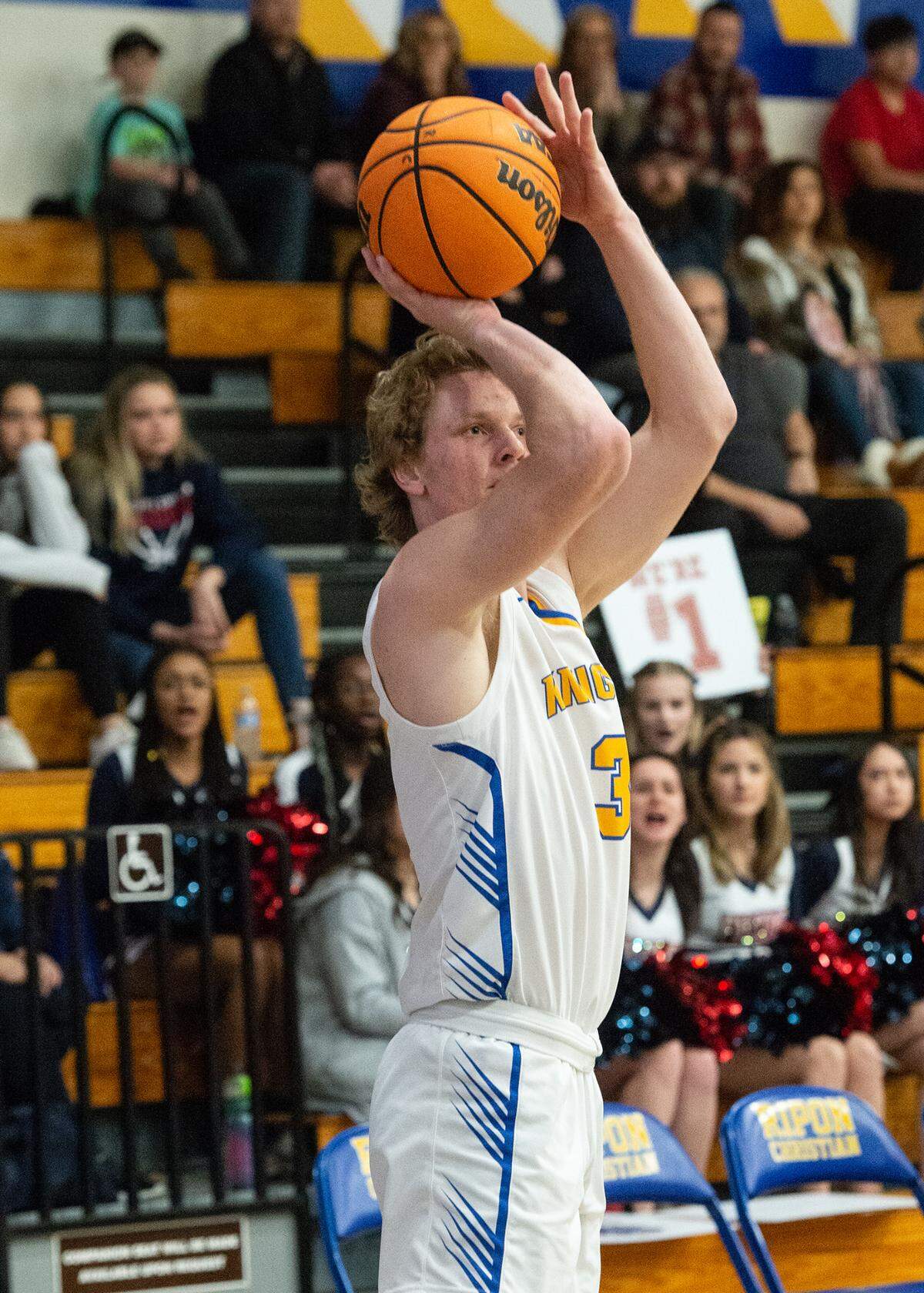 Ripon Christian’s Eli Terpsma scores a 3-point basket during the Sac-Joaquin Section Division V semifinal game against Vacaville Christian at Ripon Christian High School in Ripon, Calif., Wednesday, Feb. 22, 2023.