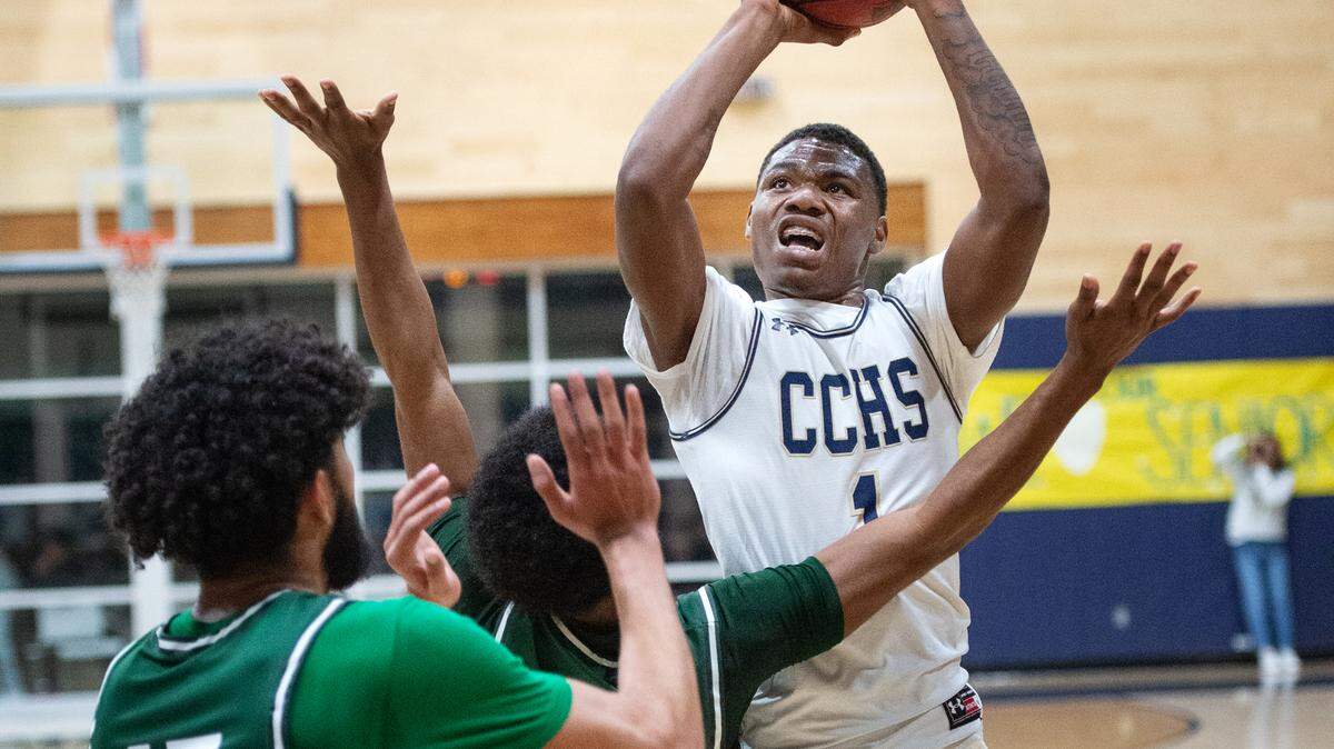 Central Catholic’s Malachi Miller shoots a jump shot during the Valley Oak League game with Manteca at Central Catholic High School in Modesto, Calif., on Wednesday, Feb. 9, 2022.