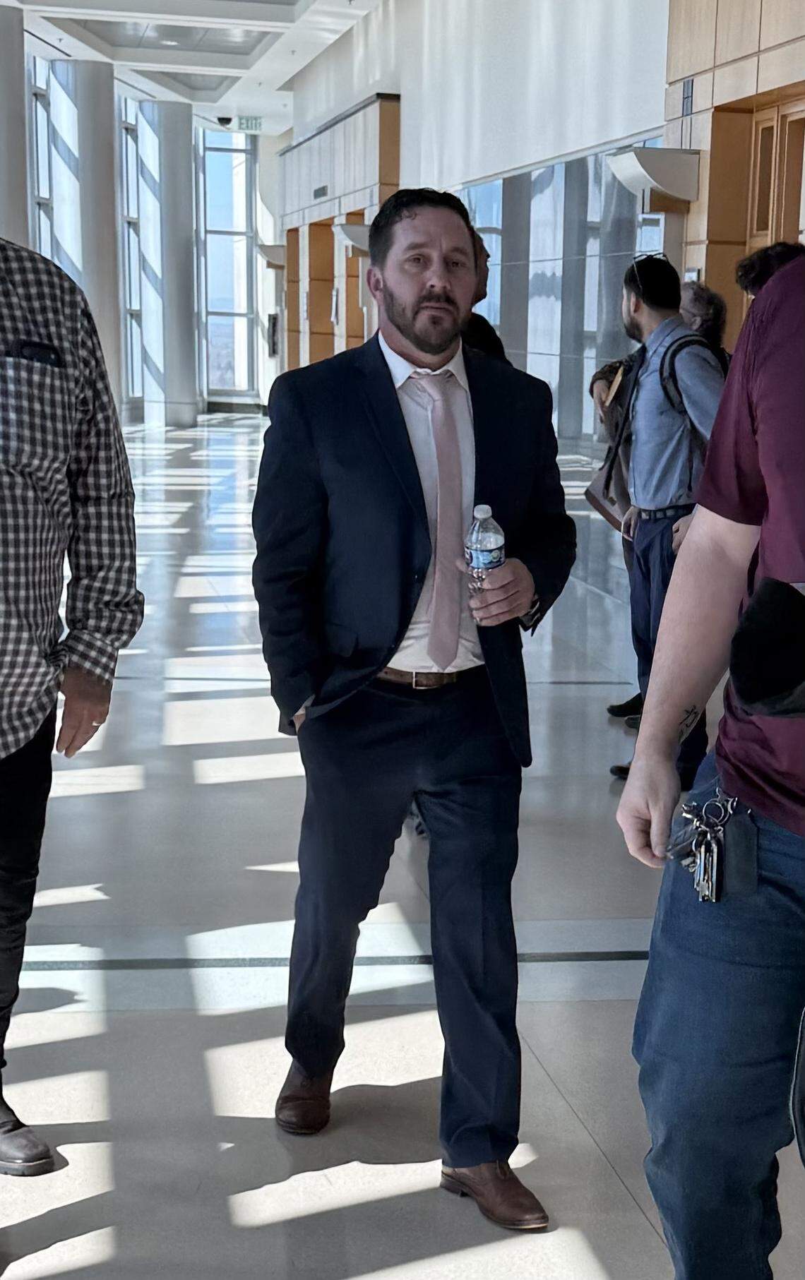 Former Patterson Joint Unified School District assistant superintendent Jeffrey Menge walks outside Courtroom 6 at Robert T. Matsui Federal Courthouse in Sacramento after being sentenced Tuesday to 30 months in prison for theft involving programs receiving federal funds.