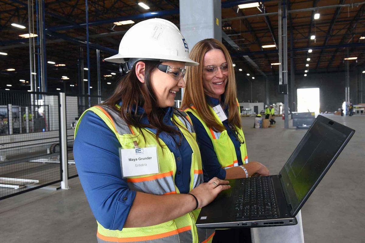 Entekra engineer Maya Grunder (left) and Katie Brown with sales support administration check on a 3-D framing project Monday November 4, 2019 at the plant in Modesto, Calif.