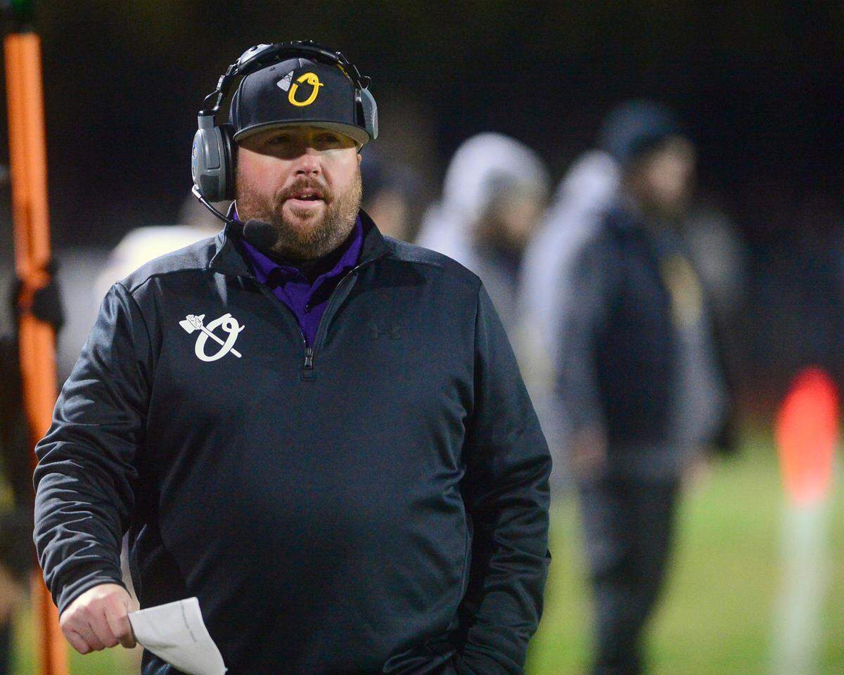 Orestimba coach Aaron Souza walks the sideline during a Sac-Joaquin Section Division VI playoff game against Hughson in Hughson, California, on Nov. 18, 2022. Hughson won 21-17.