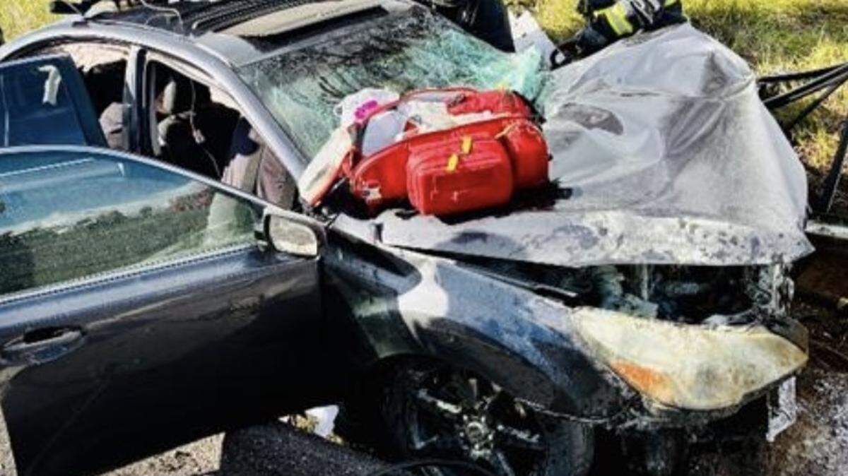 Emergency personnel work at the scene of a fatal head-on crash on State Route 108/120 west of Kennedy Road near Oakdale on Thursday, Feb. 19, 2026.