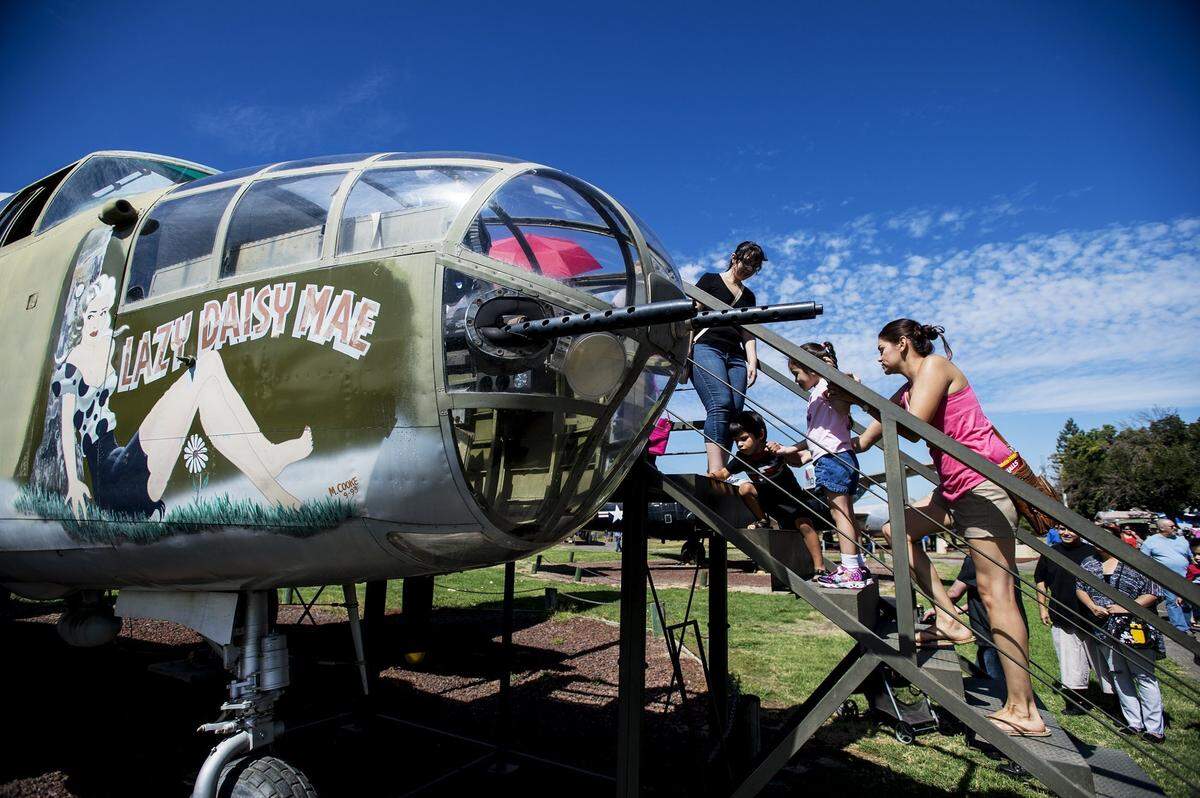 Visitors check out an aircraft during the 2016 Open Cockpit Day at Castle Air Museum in Atwater.