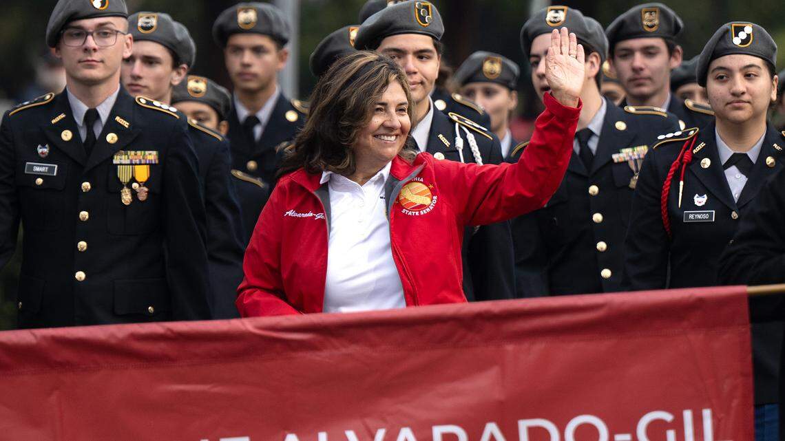 State Senator Marie Alvarado-Gil waves to the crowd during the Veterans Day parade in Modesto, Tuesday, Nov. 11, 2025.