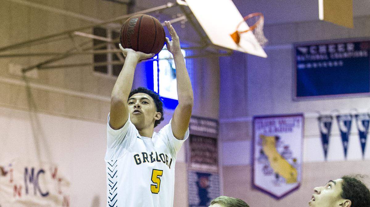 Julian Brown, (5) of Gregori, pulls up for a jump shot, during the basketball matchup between Gregori High of Modesto, and Liberty Ranch High of Galt, at the Modesto Christian Holiday Hoop Classic tournament, on Saturday, Dec. 28, 2019, in Modesto, California.
