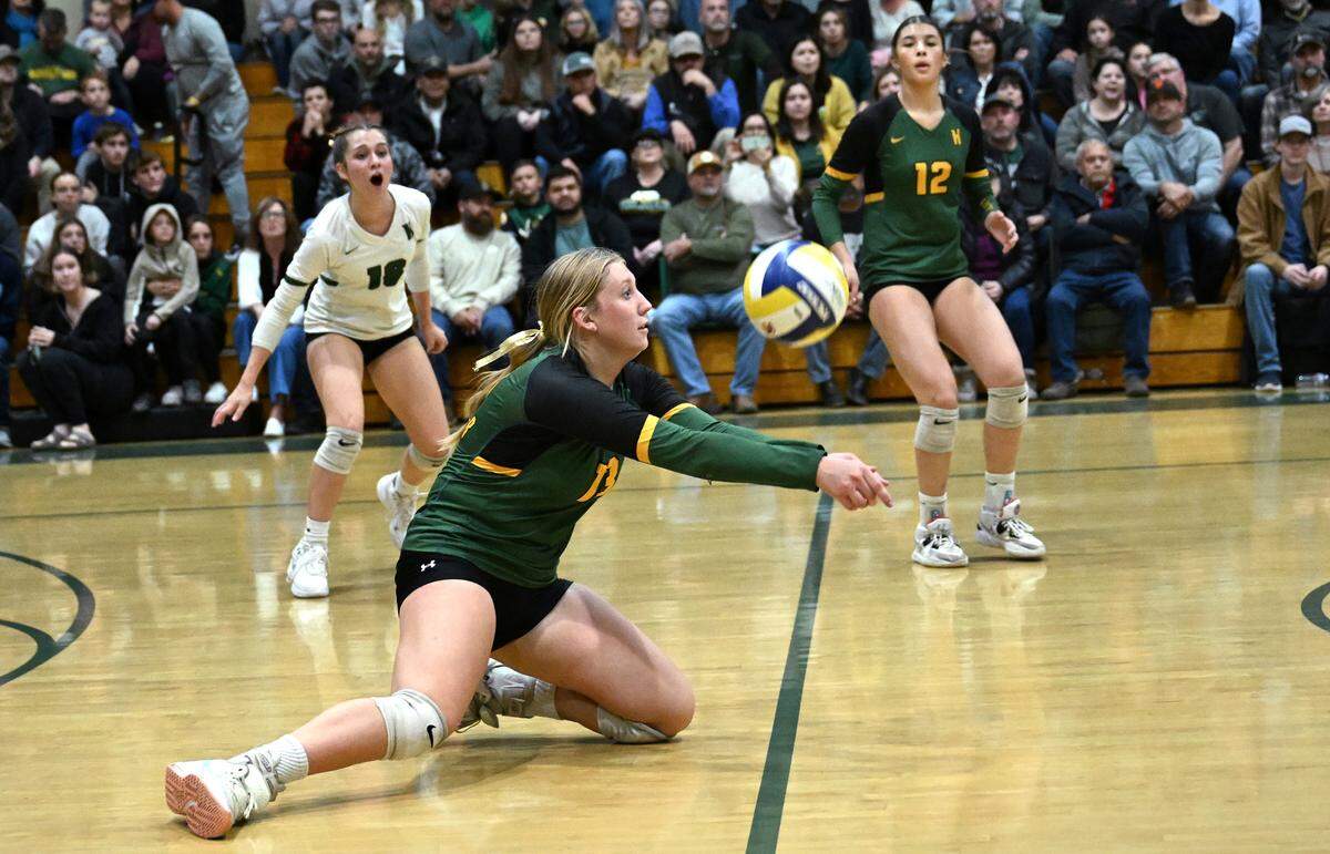 Hilmar’s Stella Pires digs the ball out during the CIF Northern California Division IV volleyball championship match with St. Patrick-St. Vincent of Vallejo at Hilmar High School in Hilmar, Tuesday, Nov. 19, 2024.