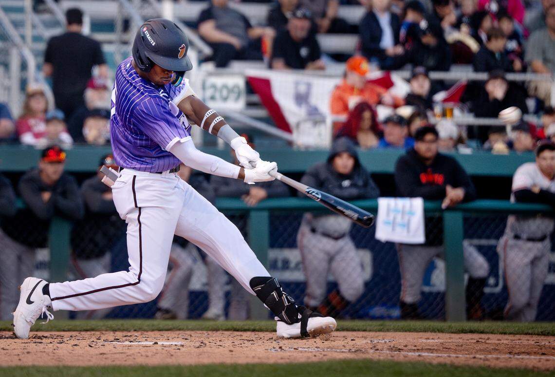 Modesto Nuts’ Curtis Washington Jr. drives a double during the game with San Jose Giants at John Thurman Field in Modesto, Friday, April 4, 2025.