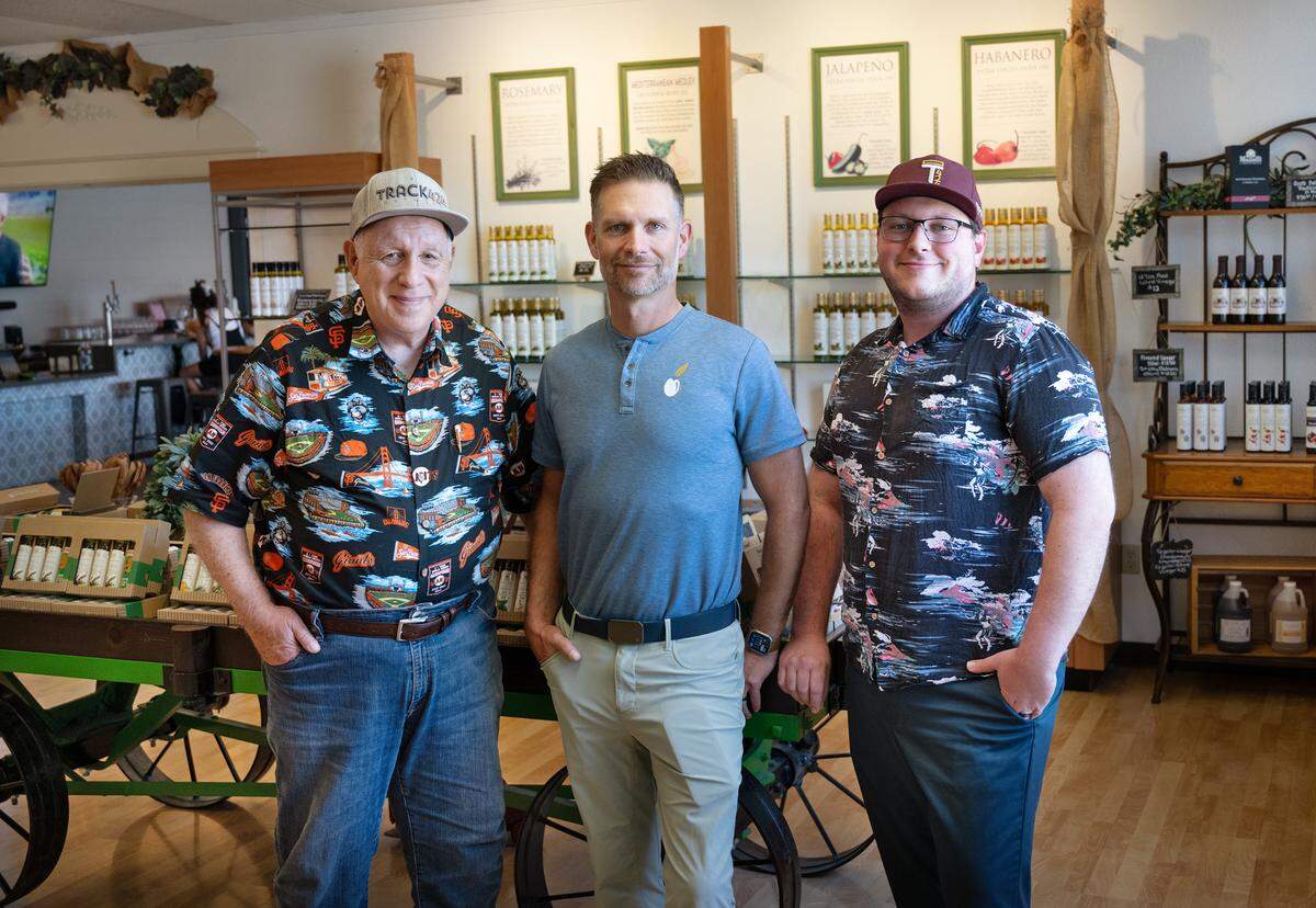 Three generations of oil olive makers from the left, Daniel Sciabica, Jonathan Sciabica and Andrew Sciabica at Sciabica’s California Olive Oil in Modesto, Calif., Friday, June 28, 2024.