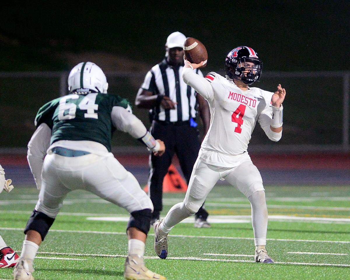 Modesto High quarterback Israel Ceniceros (4) throws a screen pass during a game between Modesto High School and Central Valley High School at Gregori High School in Modesto, Calif., on Sept. 13, 2024.