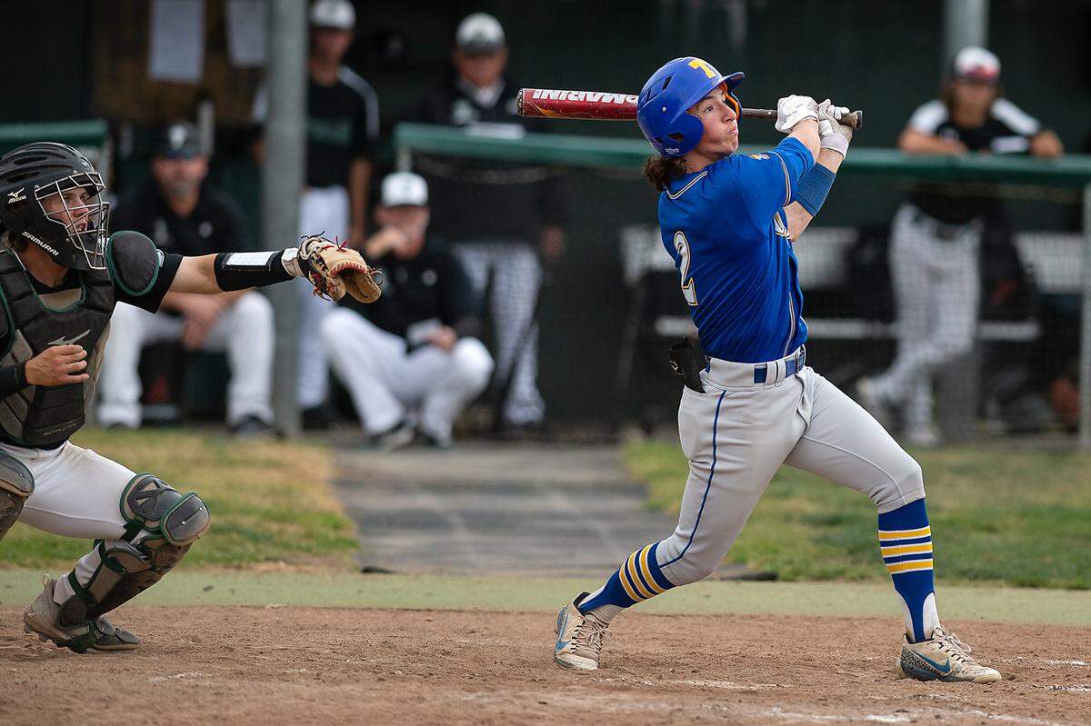 Turlock’s Gannon Evans connects for a triple during play in the Central California Athletic League game with Pitman at Pitman High School in Turlock, Calif., on Thursday, April 14, 2022.