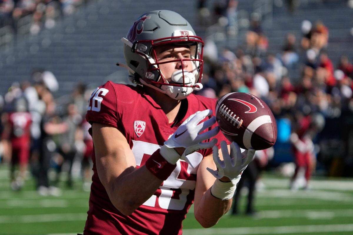 Washington State wide receiver Anderson Grover (26) in the first half during an NCAA college football game against Arizona, Saturday, Nov. 19, 2022, in Tucson, Ariz. (AP Photo/Rick Scuteri)