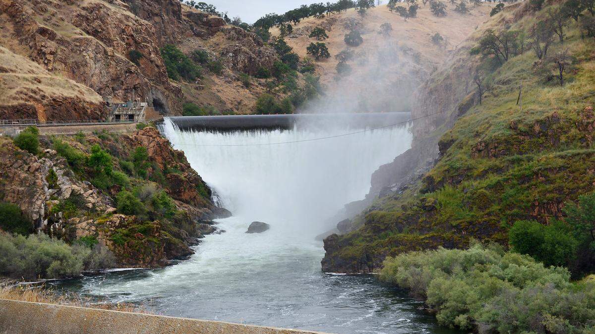 Tuolumne River is cresting the La Grange dam, a rare event that happens only in time of abundant water. Photographed in La Grange, Calif., on Friday, May 26, 2017.  
