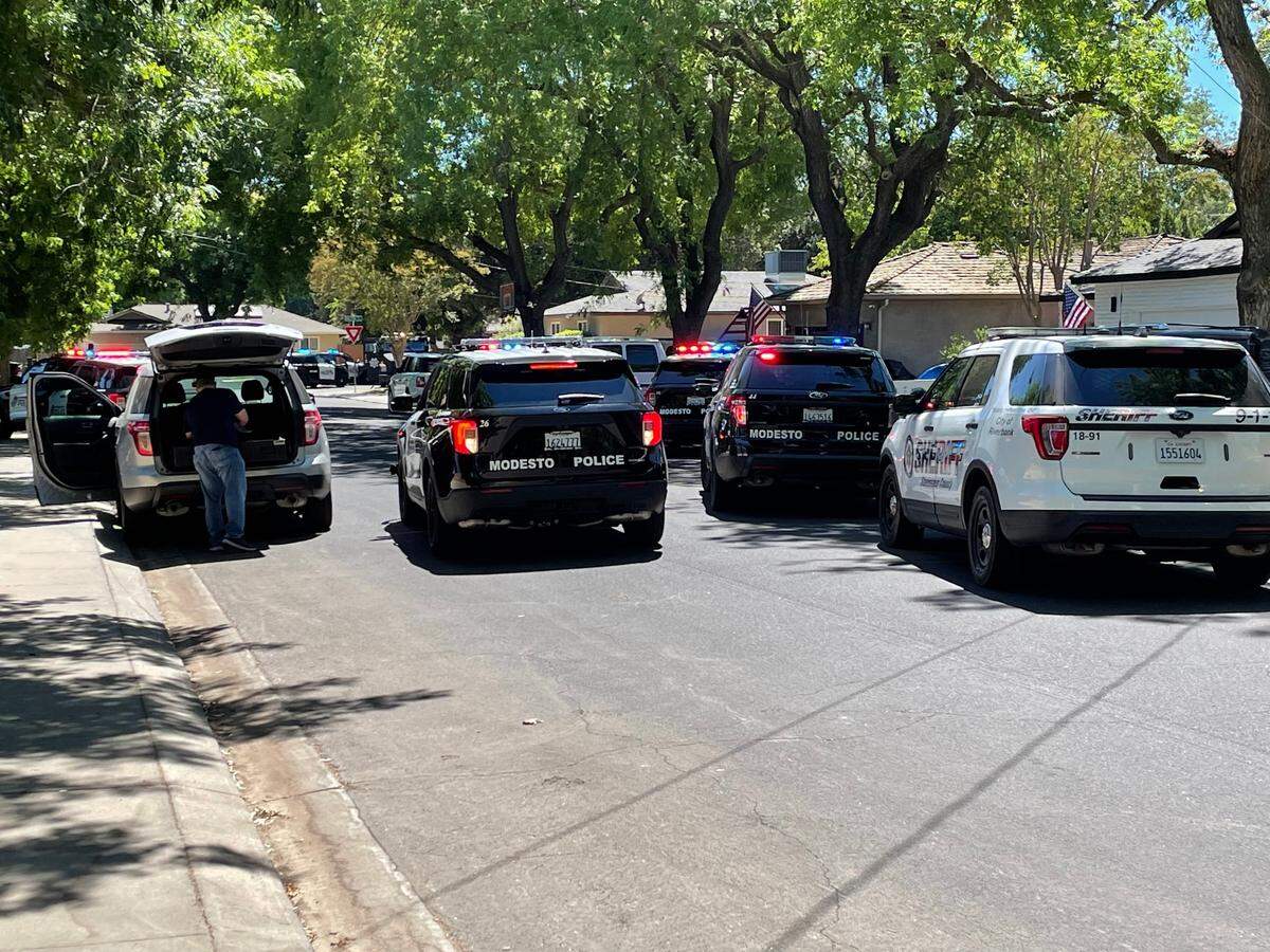 Police converged on a Modesto neighborhood, where an individual was fatally shot Sunday afternoon, July 10, 2022.