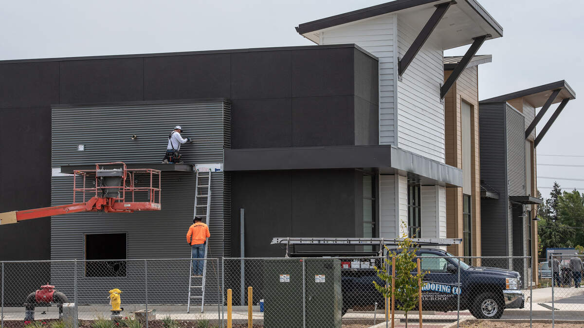 Exterior work is being done on a new Starbucks Coffee house across from Kaiser Medical Center on Dale Road in Modesto, Calif., on Wednesday, June 16, 2021.