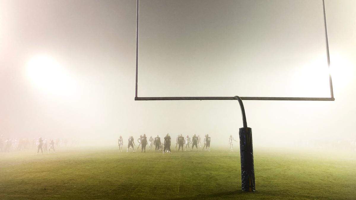 Thick fog descended on the field to make playing conditions difficult during the second round Sac-Joaquin Section football playoff game between Central Catholic and Lodi in Modesto ,Calif., on Friday, Nov. 12, 2021.