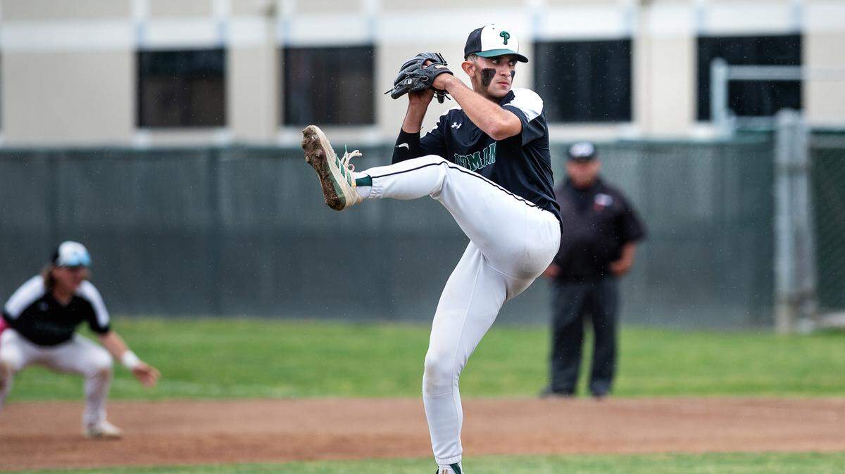 Mateo Garcia delivers a pitch during a California Athletic League game with Turlock at Pitman High School in Turlock, Calif., on Thursday, April 14, 2022.