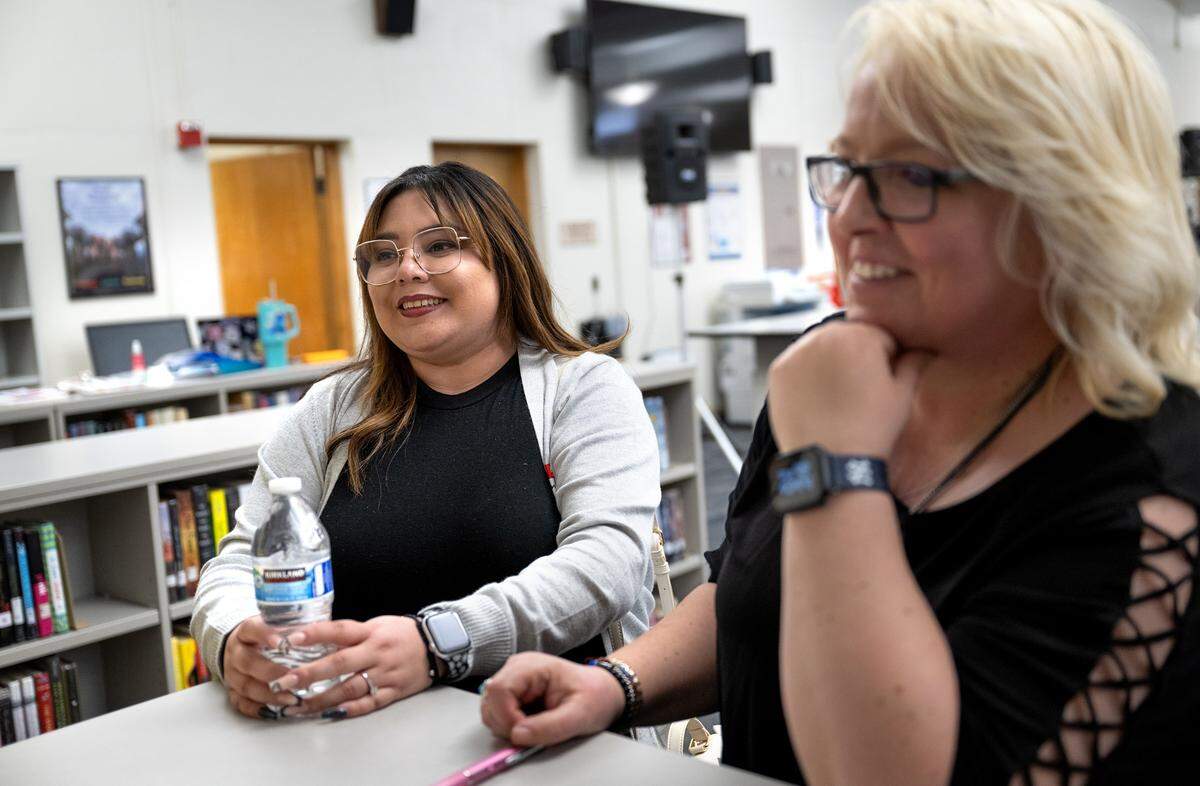 Jasmine Martinez, a former Modesto High student, left, was one of 30 guest speakers during the Day of Respect which was organized by English teacher Andrea Pegarella, right, at Modesto High School in Modesto Wednesday, March, 5, 2025.