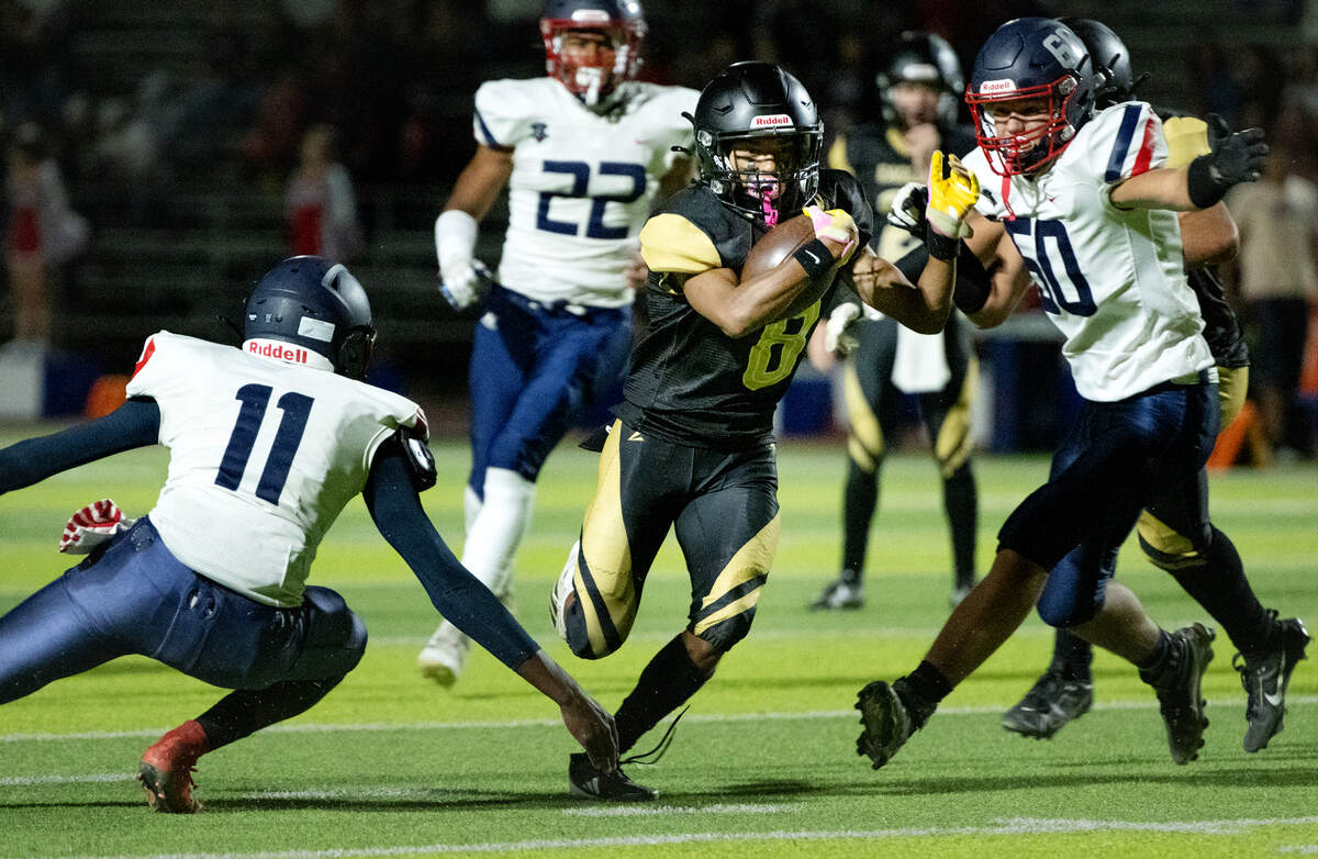 Enochs’ Eric Myles scores on a touchdown run during the game with Beyer at Downey High School in Modesto, Calif., Friday, Aug. 23, 2024.