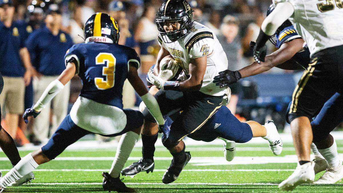 Buhach Colony’s Jaxson Percoats runs the ball during Friday’s game with Gregori at Gregori High School in Salida, Calif., on August 19, 2022. Buhach Colony won the game 19-0.