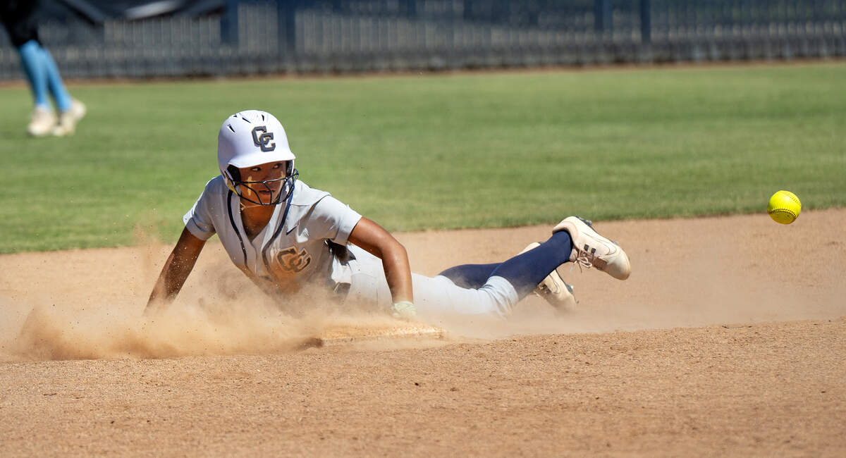 Central Catholic Samantha Nichols steals second in the Sac-Joaquin Section D-IV softball championship game with Wood of Vacaville at Cosumnes River College in Sacramento on May 23, 2026. The Raiders won the title 8-3.