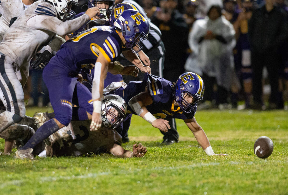 Escalon and Northwood players scramble for a loose ball in the CIF State Division 4-AA Football Championship game in Escalon, Calif., Saturday, Dec. 10, 2022. Escalon recovered the Norrthwood fumble.