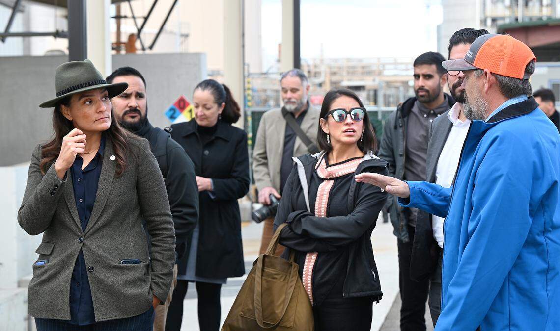 Mike Jones, maintenance operations director for the Keyes Community Services District, right, gives officials, including, Yana Garcia, California Environmental Protection Agency secretary, middle, and Martha Guzman, regional administrator for the U.S. EPA, left, at tour of the district’s system for filtering out arsenic from wells supplying drinking water to the residents of Keyes, Calif. Photographed Wednesday, Nov. 2, 2022. The drinking water system for Keyes is getting $20.4 million from the federal infrastructure bill for water treatment projects.