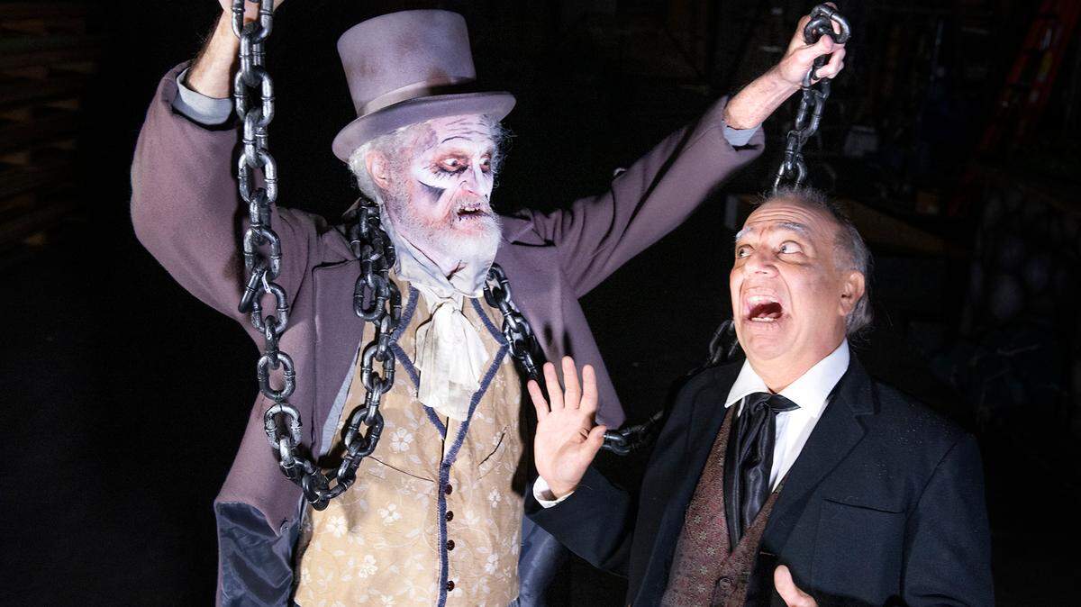 Reprising their roles from previous productions are Jimmy Gonzales, right, who will star as Scrooge, and Marty Cox, left, as the ghost of Jacob Marley in Modesto Performing Arts’ production of “A Christmas Carol”. Photographed in Modesto Calif., on Tuesday, Nov. 9, 2021.