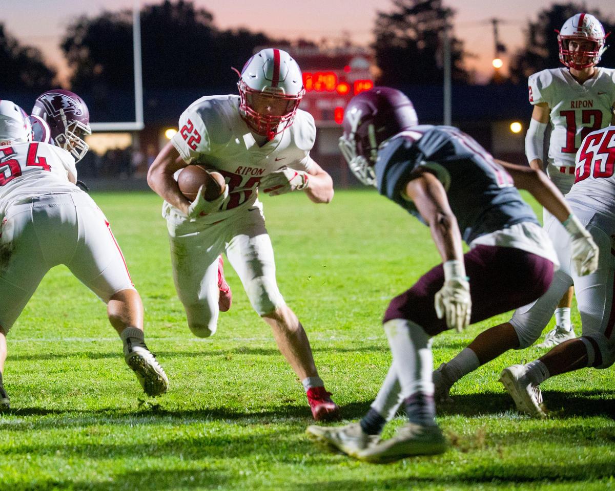 Ripon running back Grant Wiebe (22) runs into the end zone for a touchdown during a game between Ripon High School and Central Valley High School at Ceres High School in Ceres California on September 6, 2019.