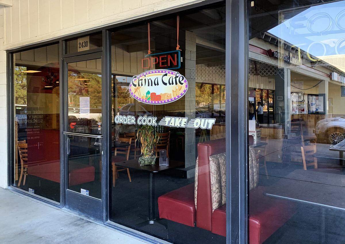 The exterior of the China Cafe in Turlock, Calif. Oct. 3, 2019. A sign on the door alerts customers to their closure.